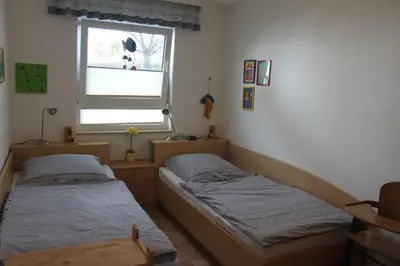 Ein Bett oder Betten in einem Zimmer der Unterkunft Fewo Strandrevier