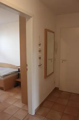 Ein Bett oder Betten in einem Zimmer der Unterkunft Fewo Strandrevier