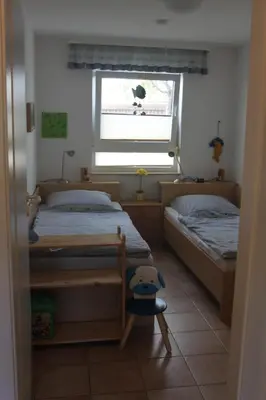 Ein Bett oder Betten in einem Zimmer der Unterkunft Fewo Strandrevier