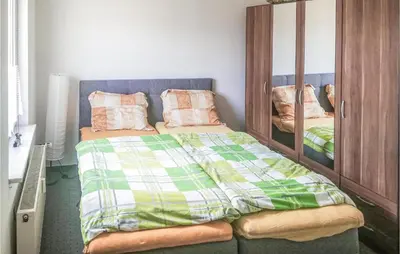 Ein Bett oder Betten in einem Zimmer der Unterkunft 1 Bedroom Nice Apartment In Barth