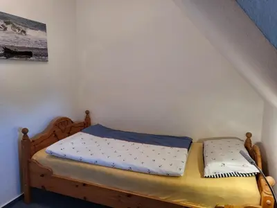 Ein Bett oder Betten in einem Zimmer der Unterkunft Kiek mal Kiek, Whg 7