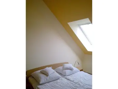 Ein Bett oder Betten in einem Zimmer der Unterkunft Residenz am Strand Wohnung 2-44