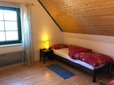 Ein Bett oder Betten in einem Zimmer der Unterkunft TROLLHUS - Großes familienfreundliches Ferienhaus