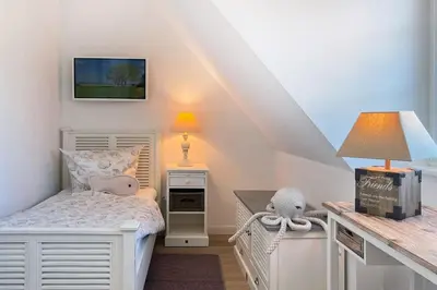 Ein Bett oder Betten in einem Zimmer der Unterkunft Strandhaus Zingst