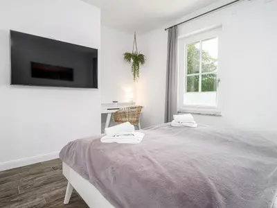 Ein Bett oder Betten in einem Zimmer der Unterkunft 