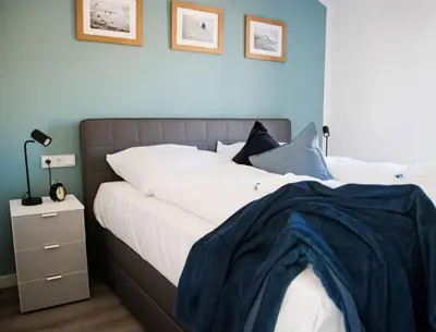 Ein Bett oder Betten in einem Zimmer der Unterkunft Ferienhaus 