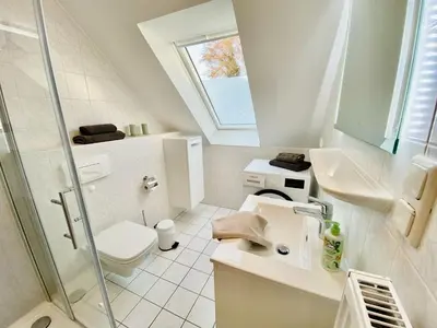 Ein Badezimmer in der Unterkunft Boddenkieker 04