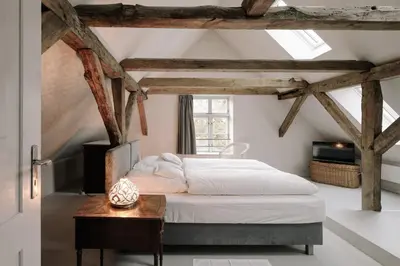 Ein Bett oder Betten in einem Zimmer der Unterkunft Apartment Alte Schmiede