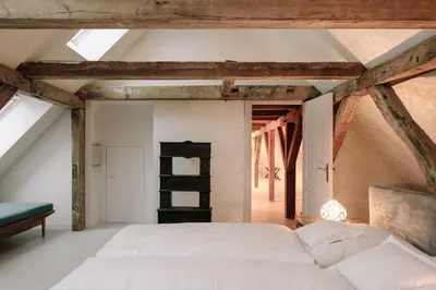 Ein Bett oder Betten in einem Zimmer der Unterkunft Apartment Alte Schmiede