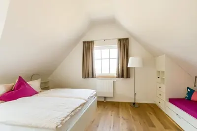 Ein Bett oder Betten in einem Zimmer der Unterkunft Haus Wiesenweite