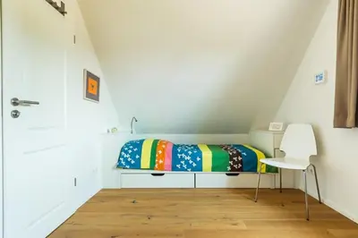 Ein Bett oder Betten in einem Zimmer der Unterkunft Haus Wiesenweite