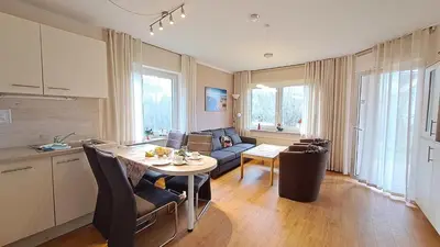 Ein Sitzbereich in der Unterkunft Apartment Prerower Straße