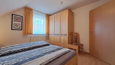 Ein Bett oder Betten in einem Zimmer der Unterkunft Apartment Hoppenberg