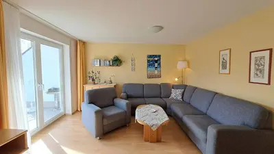 Ein Sitzbereich in der Unterkunft Apartment Hoppenberg