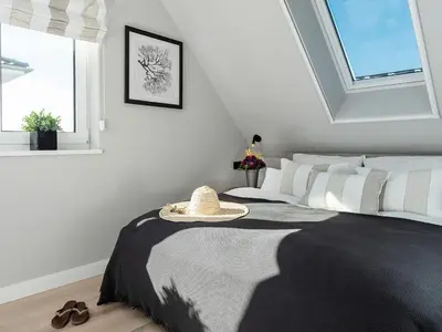 Ein Bett oder Betten in einem Zimmer der Unterkunft Meine Schöne 21a
