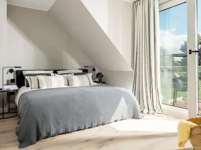Ein Bett oder Betten in einem Zimmer der Unterkunft Meine Schöne 21a