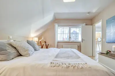Ein Bett oder Betten in einem Zimmer der Unterkunft Ventus