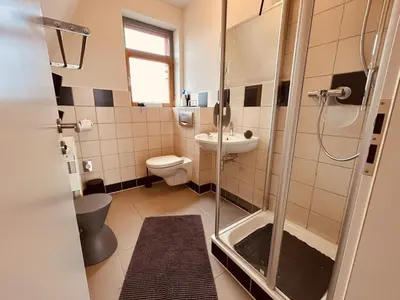 Ein Badezimmer in der Unterkunft Aalreuse
