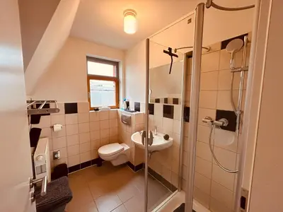 Ein Badezimmer in der Unterkunft Aalreuse