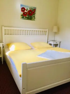 Ein Bett oder Betten in einem Zimmer der Unterkunft Am Eichberg