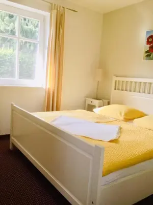 Ein Bett oder Betten in einem Zimmer der Unterkunft Am Eichberg