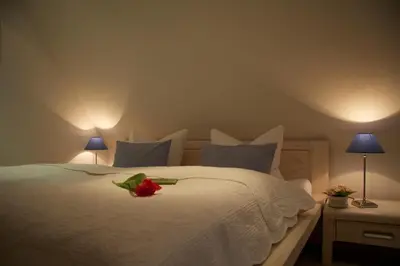 Ein Bett oder Betten in einem Zimmer der Unterkunft Am Trommelplatz - Ferienwohnung 4