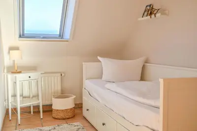 Ein Bett oder Betten in einem Zimmer der Unterkunft FH Tannenwieck - Austernfischer OG