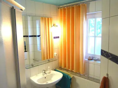 Ein Badezimmer in der Unterkunft Boddenparadies - Baltija