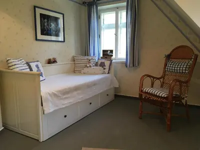 Ein Bett oder Betten in einem Zimmer der Unterkunft Ferienwohnung zur Brake