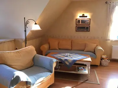 Ein Sitzbereich in der Unterkunft Ferienwohnung zur Brake