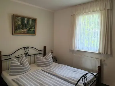 Ein Bett oder Betten in einem Zimmer der Unterkunft Buhne I EG