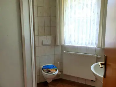Ein Badezimmer in der Unterkunft Buhne I EG