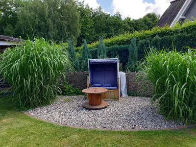 Ein Garten an der Unterkunft Buhne I EG