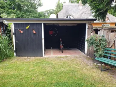 Ein Garten an der Unterkunft Buhne II OG