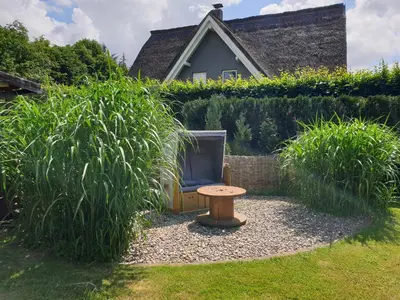 Ein Garten an der Unterkunft Buhne II OG