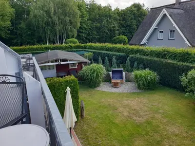 Ein Garten an der Unterkunft Buhne II OG