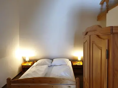 Ein Bett oder Betten in einem Zimmer der Unterkunft Pension Martens - Carla