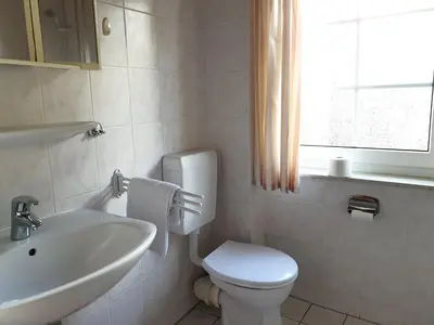Ein Badezimmer in der Unterkunft Pension Martens - Carla