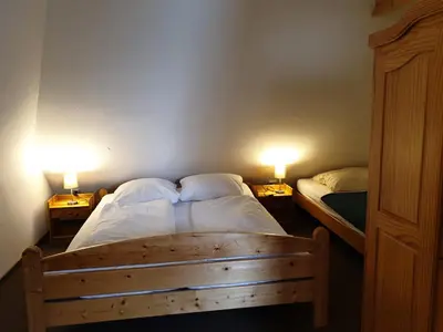 Ein Bett oder Betten in einem Zimmer der Unterkunft Pension Martens - Carla