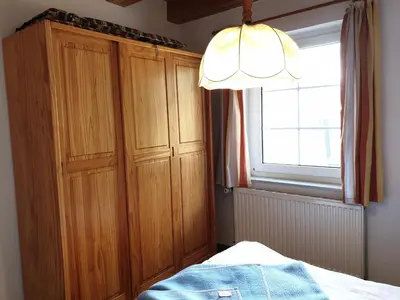 Ein Bett oder Betten in einem Zimmer der Unterkunft Pension Martens - Carla