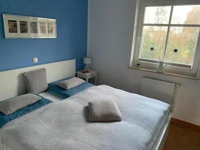 Ein Bett oder Betten in einem Zimmer der Unterkunft Am Haferland 