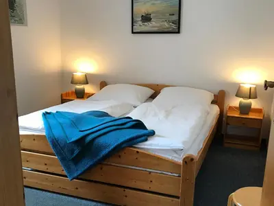 Ein Bett oder Betten in einem Zimmer der Unterkunft Pension Martens - Ella