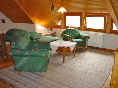 Ein Sitzbereich in der Unterkunft Pension Martens - Gaubenwohnung