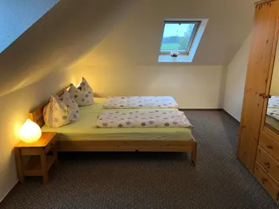 Ein Bett oder Betten in einem Zimmer der Unterkunft Graureiher