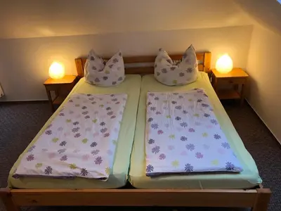 Ein Bett oder Betten in einem Zimmer der Unterkunft Graureiher