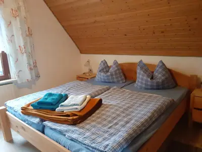 Ein Bett oder Betten in einem Zimmer der Unterkunft Große Fewo 1
