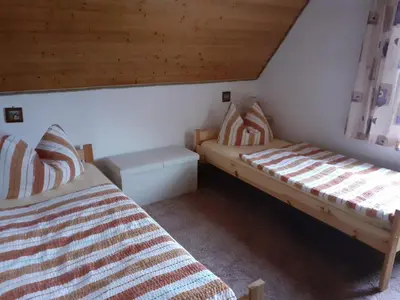 Ein Bett oder Betten in einem Zimmer der Unterkunft Große Fewo 1