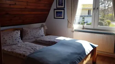 Ein Bett oder Betten in einem Zimmer der Unterkunft Hagebutte