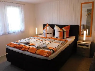 Ein Bett oder Betten in einem Zimmer der Unterkunft Haus Krüger