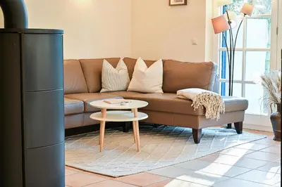 Ein Sitzbereich in der Unterkunft FH Tannenwieck - FH Tannenwieck Ferienwohnung Kormoran EG